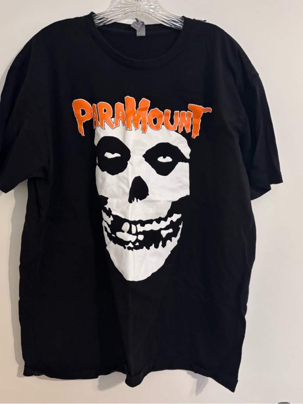 Paramount Black Short-Sleeve Graphic Tee with White Skull and Orange Logo